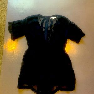 Little black romper.